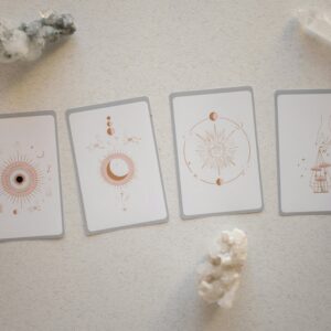 Top view of tarot cards and crystals, perfect for spiritual and mystical themes.